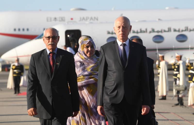 Tunisian President Kais Saied, right, welcomes the head of the Polisario Front movement, Brahim Ghali, on his arrival in Tunis. EPA