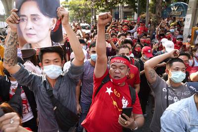 NLD supporters shout slogans outside Myanmar's embassy during a rally after the military seized power from a democratically elected civilian government and arrested its leader Aung San Suu Kyi, in Bangkok, Thailand. Reuters