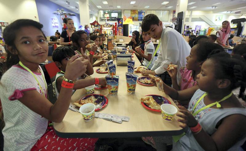 Dubai, June, 04, 2018: Orphan childrens enjoy the iftar hosted by Ibn Battuta Mall at the Chuck E Cheese restaurant at theI BN Battuta mall in Dubai. Satish Kumar for the National / Story by Patrick Ryan