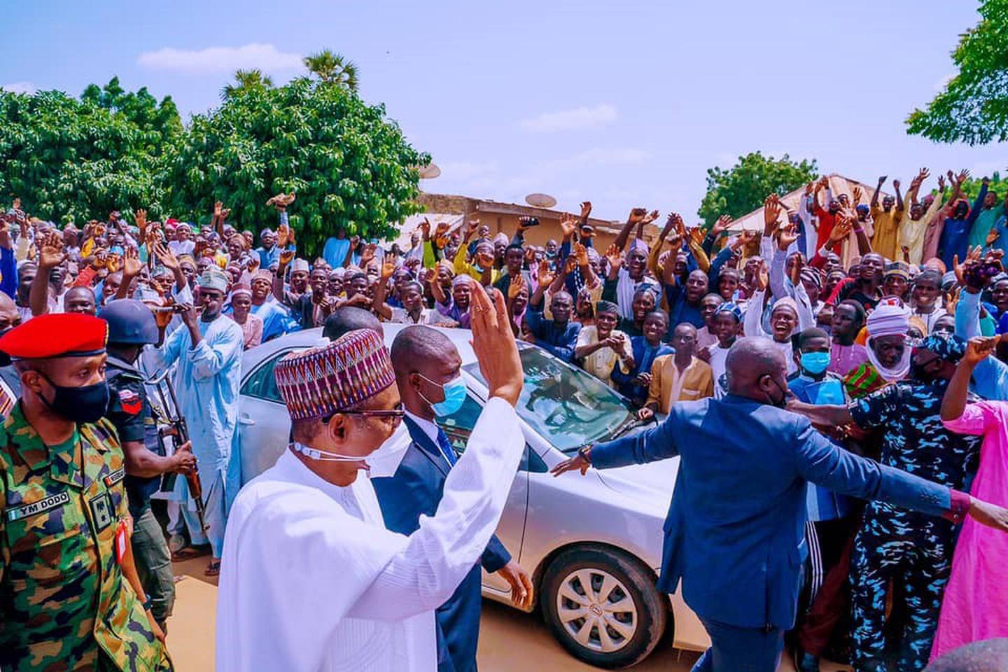 President Buhari greets supporters in Bichi. Femi Adesina / Facebook