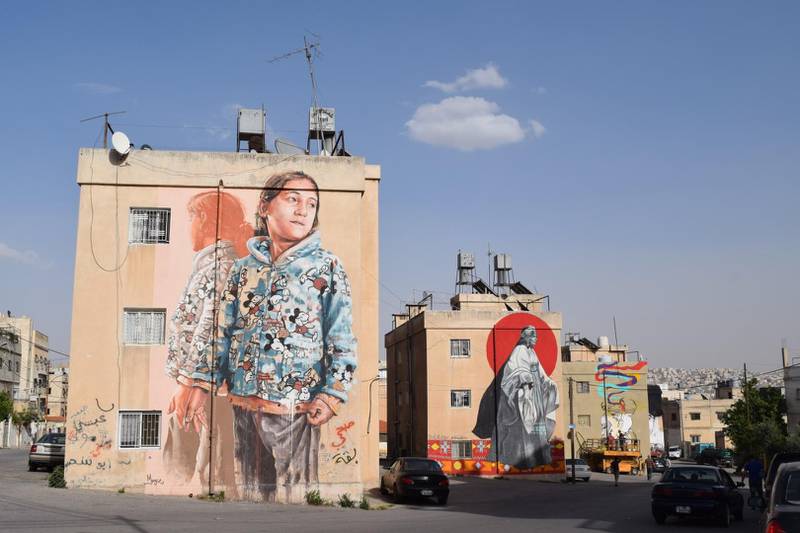 A four-piece mural installation in East Amman, featuring work by Fintan Magee (Australia), Suhaib Attar (Jordanian), Dina Saadi (Syrian-Russian based in Dubai) and Hombre SUK (Germany). Courtesy Baladk Project