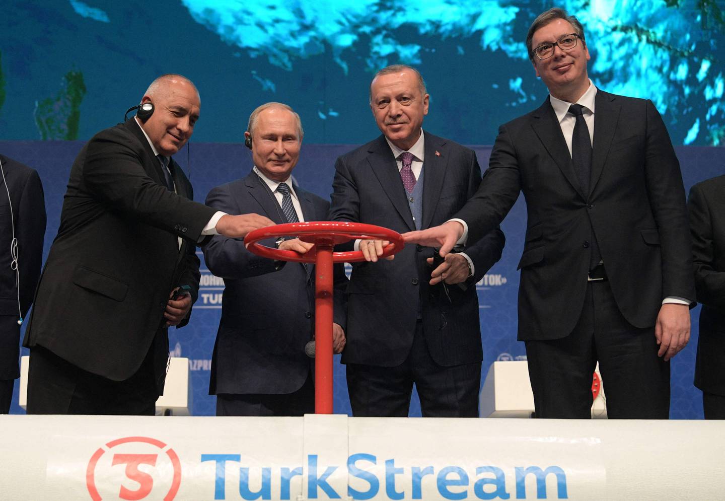 Russian President Vladimir Putin, second left, has warned Europe that gas supplies could fall further. AFP 