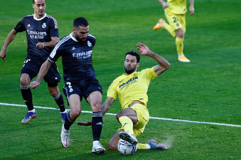 Vilarreal's Alfonso Pedraza, right, duels for the ball against Real Madrid's Dani Carvajal. EPA
