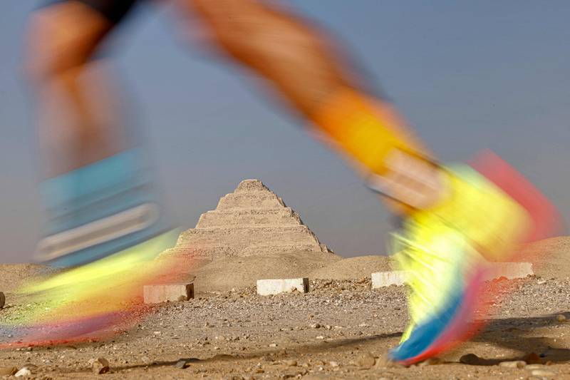 A runner runs through the historic Egyptian site. AFP