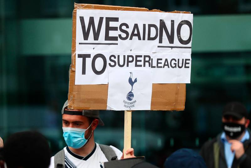 Tottenham supporters protest in front of Tottenham Hotspur Stadium. EPA