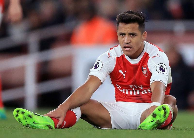 File photo dated 05-04-2017 of Arsenal's Alexis Sanchez PRESS ASSOCIATION Photo. Issue date: Wednesday August 9, 2017. Alexis Sanchez will miss Arsenal's opening two Premier League games through an abdominal injury as manager Arsene Wenger refused to reveal if the club had received any bids for the forward. See PA story SOCCER Arsenal. Photo credit should read Nigel French/PA Wire.