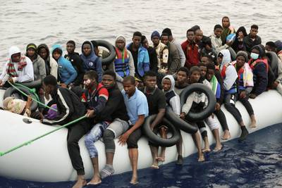 Migrants are taken to shore after being intercepted by the Libyan coastguard on the Mediterranean Sea, in Garaboli, Libya. AP