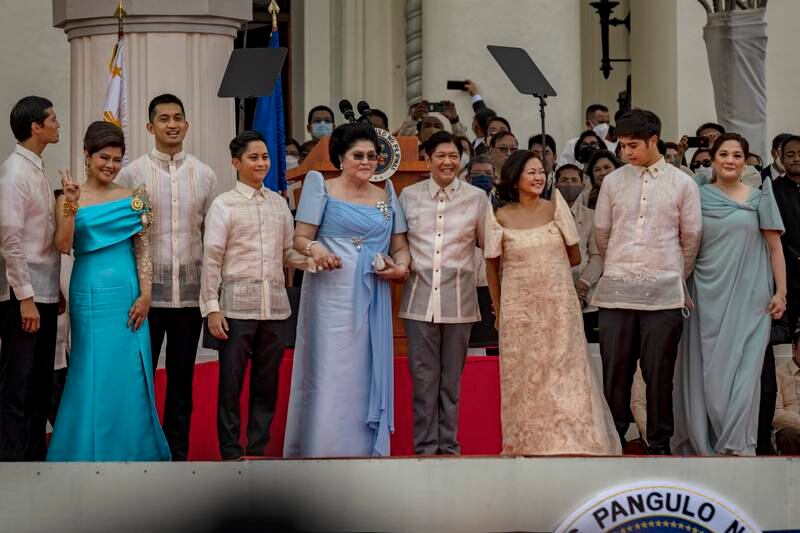 Philippines' President Ferdinand 'Bongbong' Marcos Jr, centre, is joined by his mother and former first lady Imelda at his inauguration ceremony in Manila. Getty