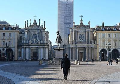Almost totally empty streets due to coronavirus restrictions are seen in Turin, Italy. EPA