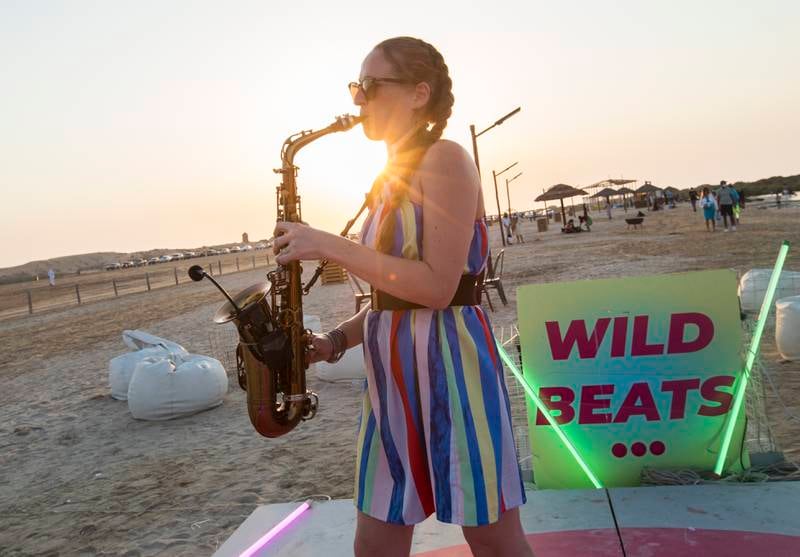 A saxophonist entertains visitors at the funky beachside hangout