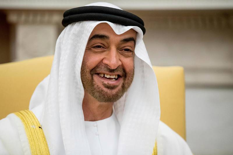 FILE - In this May 15, 2017, file photo, Abu Dhabiâ€™s crown prince, Sheikh Mohammed bin Zayed Al Nahyan, smiles during a meeting with President Donald Trump at the White House in Washington. Emails obtained by The Associated Press between business partners Elliott Broidy and George Nader indicate that the pair was working with bin Zayed in a lobbying effort to alter U.S. policy in the Middle East. (AP Photo/Andrew Harnik, File)