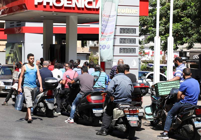 Motorcyclists wait in line for fuel at a Beirut petrol station. Fuel shortages have  affected supplies for private generators that make up for state power rationing. Meanwhile, hospitals are also running low on medical supplies. Reuters