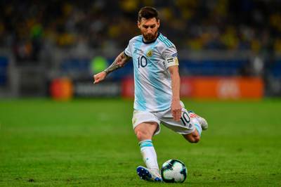 (FILES) In this file photo taken on July 02, 2019, Argentina's Lionel Messi strikes the ball during the Copa America football tournament semi-final match against Brazil at the Mineirao Stadium in Belo Horizonte, Brazil.  Messi will once again hold the baton for Argentina on its way to the World Cup Qatar 2022 football tournament, in the debut of the South American Qualification Round with Ecuador, a team that is usually a box of surprises. / AFP / Pedro UGARTE

