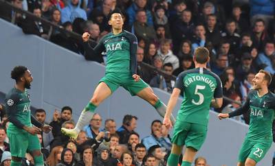 Tottenham Hotspur's South Korean striker Son Heung-min celebrates after scoring to make it 2-1 against Manchester City. AFP