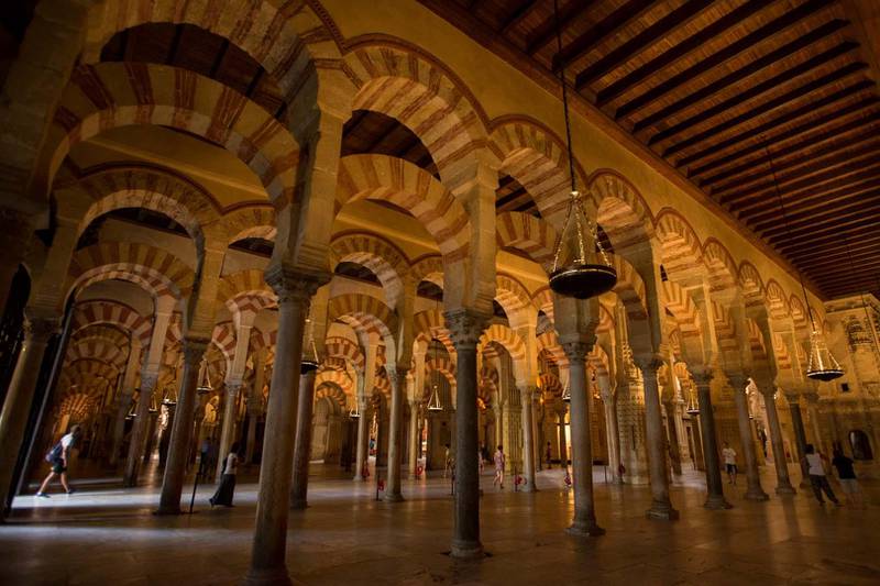 Tourists visit the Mosque-Cathedral of Córdoba, which dates to the 8th Century. Photo by Kira Walker