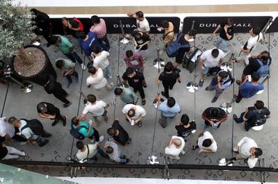People queue in Dubai Mall for the new Apple iPhone 15. All photos unless otherwise stated: Chris Whiteoak / The National