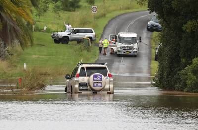 A car stuck in floodwaters near Lismore, New South Wales. EPA