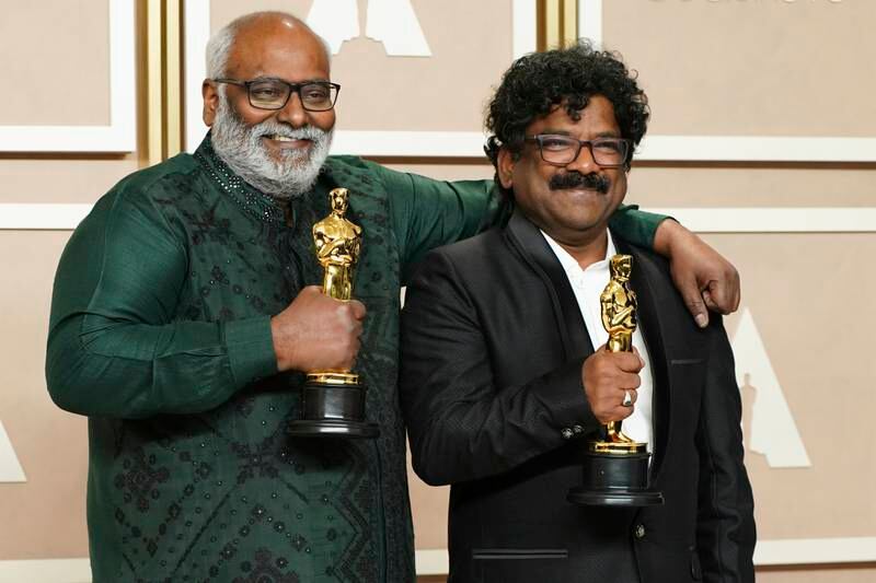 M M Keeravaani, left, and Chandrabose, winners of the award for Best Music (Original Song) for Naatu Naatu from RRR. AP