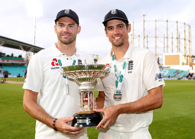 Cricket - England v India - Fifth Test - Kia Oval, London, Britain - September 11, 2018   England's Alastair Cook and James Anderson celebrate with a trophy after the match   Action Images via Reuters/Paul Childs