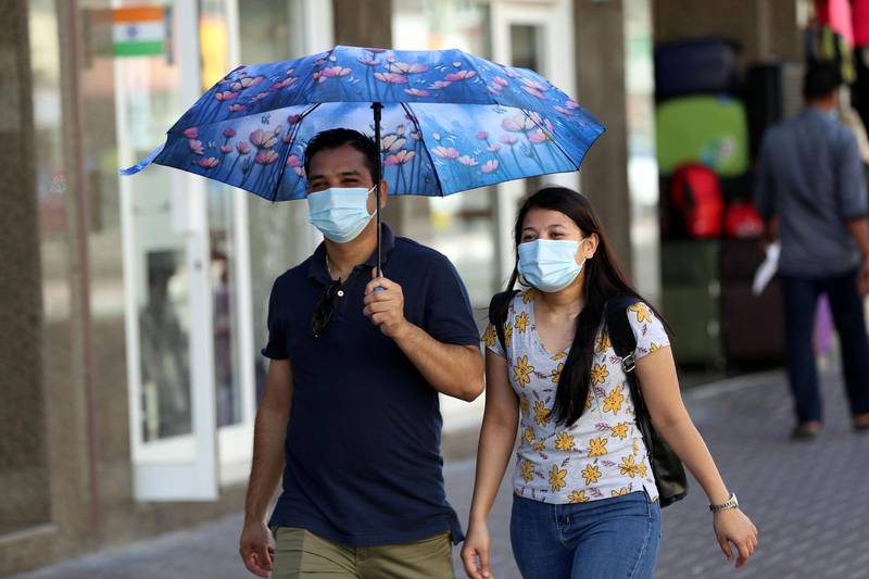 Dubai, United Arab Emirates - Reporter: N/A. News. Coronavirus/Covid-19. Two people wear masks to curb the spread of the coronavirus in Satwa, Dubai. Tuesday, October 20th, 2020. Dubai. Chris Whiteoak / The National