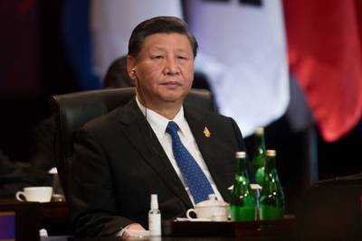 China's President Xi Jinping takes his seat with other world leaders. AFP