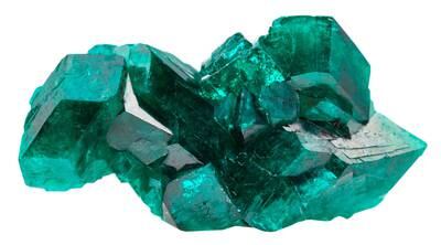 The deep green colour of dioptase crystals comes from its copper content.