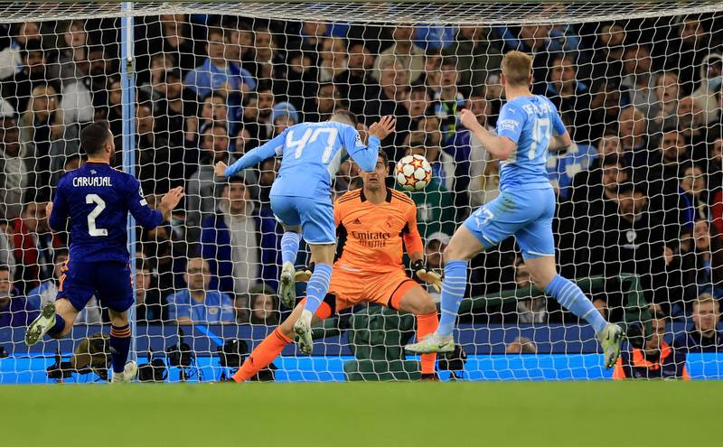 Foden makes it 3-1 to City. Action Images