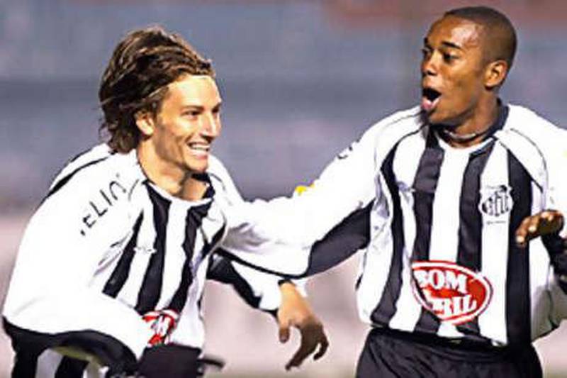 Elano, left, and Robinho celebrate a goal when the Manchester City pair played for the Brazilian giants Santos.