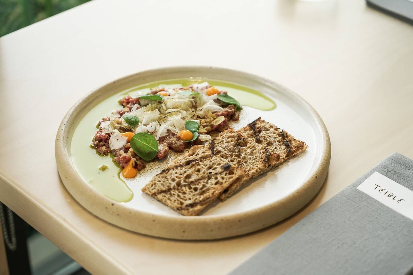 The beef garum pays homage to Anthony Bourdain's steak tartare. Photo: Teible