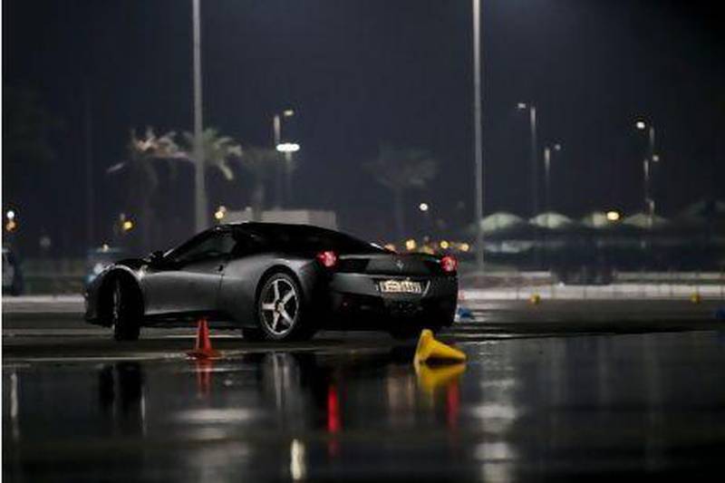 On a wet skidpad at Yas Marina, the 458 Italia is still composed. Pawel Dwulit / The National