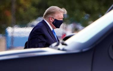 U.S. President Donald Trump arrives at Walter Reed National Military Medical Center by helicopter after the White House announced that he "will be working from the presidential offices at Walter Reed for the next few days" after testing positive for the coronavirus disease (COVID-19), in Bethesda, Maryland, U.S., October 2, 2020. REUTERS/Joshua Roberts TPX IMAGES OF THE DAY