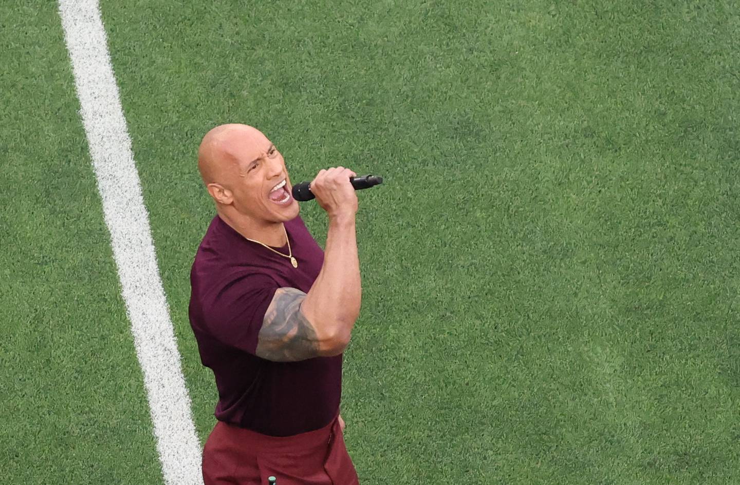Dwayne 'The Rock' Johnson introducing the teams at the Super Bowl. Reuters