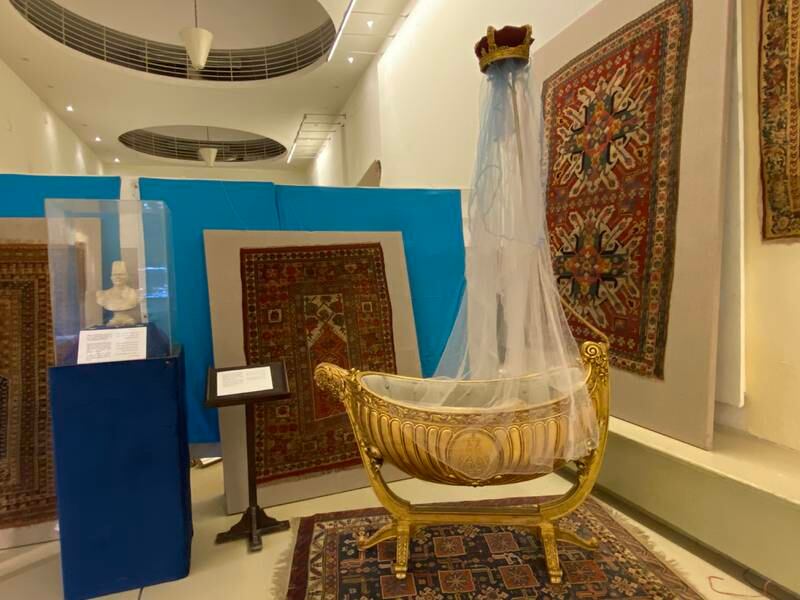 The golden cradle of King Farouk, made of gilded wood and engraved with his monogram, was seized in the cargo village at Cairo International Airport in 2010. Nada El Sawy / The National