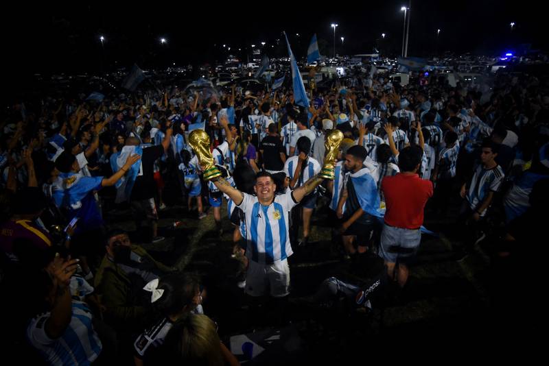 Fans gather outside of the Association of Argentinian Football Headquarters ahead of the team arrival. Reuters