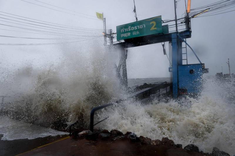 Waves due to tropical storm Pabuk crash into a pier in the southern Thai province of Surat Thani.  AFP