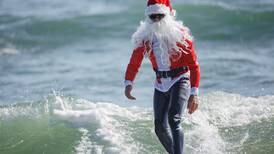 Florida's surfing Santas - in pictures