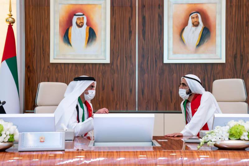 Sheikh Mohammed bin Rashid, Prime Minister and Ruler of Dubai, speaks to Sheikh Saif bin Zayed, Deputy Prime Minister and Minister of Interior, during a UAE Cabinet meeting on Sunday. Courtesy: Sheikh Mohammed bin Rashid Twitter