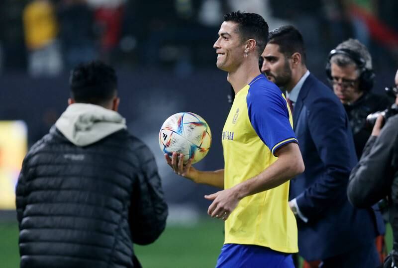 New Al Nassr signing Cristiano Ronaldo walks out on to the Mrsool Park pitch. Reuters