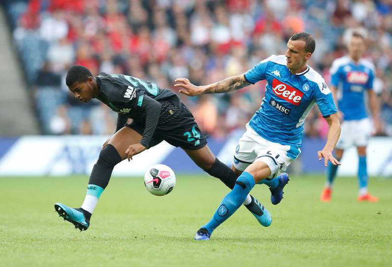 Liverpool's Rhian Brewster in action with Napoli's Vlad Chiriches. Reuters