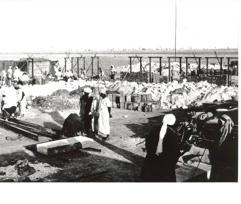 This image shows the construction of the foundations of Al Mahatta's rest house in August 1932. Kenneth Mackay / Courtesy Dr Sultan Al Qasimi Centre for Gulf Studies - Al Darah