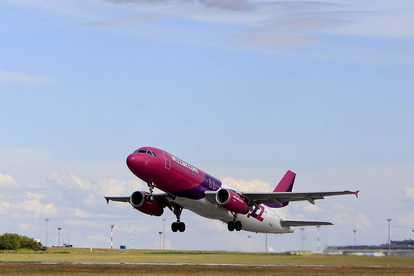 Wizz Air runs an offsetting scheme for passengers to calculate their carbon footprint and offset their flights. Reuters