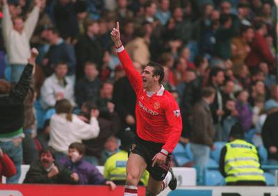 20 MAR 1993:  A PICTURE SHOWING ERIC CANTONA OF MANCHESTER UNITED SOCCER CLUB AS HE CELEBRATES SCORING A GOAL DURING THEIR MATCH AGAINST MANCHESTER CITY Mandatory Credit: Chris Cole/ALLSPORT