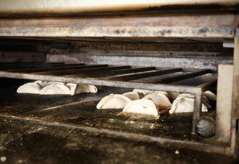 Fatayer bakes in the oven at Forn Al Hayer. Photo: Steve LaBate