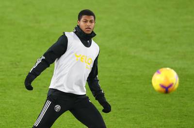 Sheffield United's English striker Rhian Brewster warms up before the English Premier League football match between Sheffield United and Everton at Bramall Lane in Sheffield, northern England on December 26, 2020. (Photo by Alex Livesey / POOL / AFP) / RESTRICTED TO EDITORIAL USE. No use with unauthorized audio, video, data, fixture lists, club/league logos or 'live' services. Online in-match use limited to 120 images. An additional 40 images may be used in extra time. No video emulation. Social media in-match use limited to 120 images. An additional 40 images may be used in extra time. No use in betting publications, games or single club/league/player publications. / 