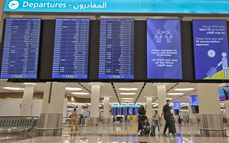 Dubai International Airport. Employers are required to approve leave requests before a staff member can take time off work. AFP