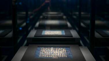 Folios of the Blue Quran displayed in the Letters of Light exhibition at Louvre Abu Dhabi. Khushnum Bhandari / The National