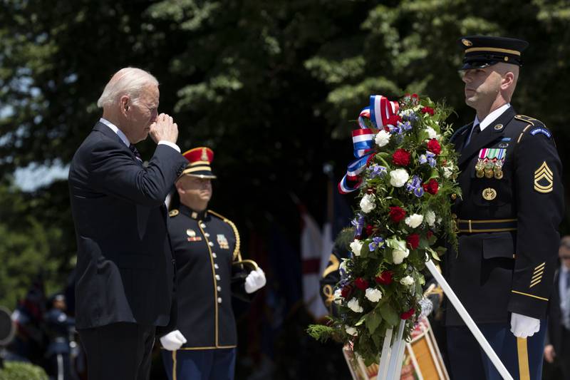 US President Joe Biden takes part in a wreath-laying ceremony at the Tomb of the Unknown Soldier at Arlington National Cemetery in Virginia on Monday. Bloomberg