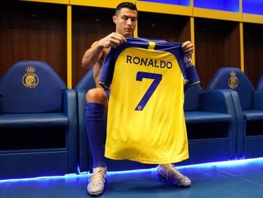 A handout photo made available by the Saudi Al-Nassr Club on 04 January 2023 shows Al-Nassr's new Portuguese forward Cristiano Ronaldo holding his jersey ahead of a presenting ceremony in Riyadh, Saudi Arabia, 03 January 2023.  Cristiano Ronaldo is presented at Mrsool Park stadium on 03 January after he signed a contract for Al-Nassr FC until 2025.   EPA / AL-NASSR CLUB HANDOUT  HANDOUT EDITORIAL USE ONLY / NO SALES
