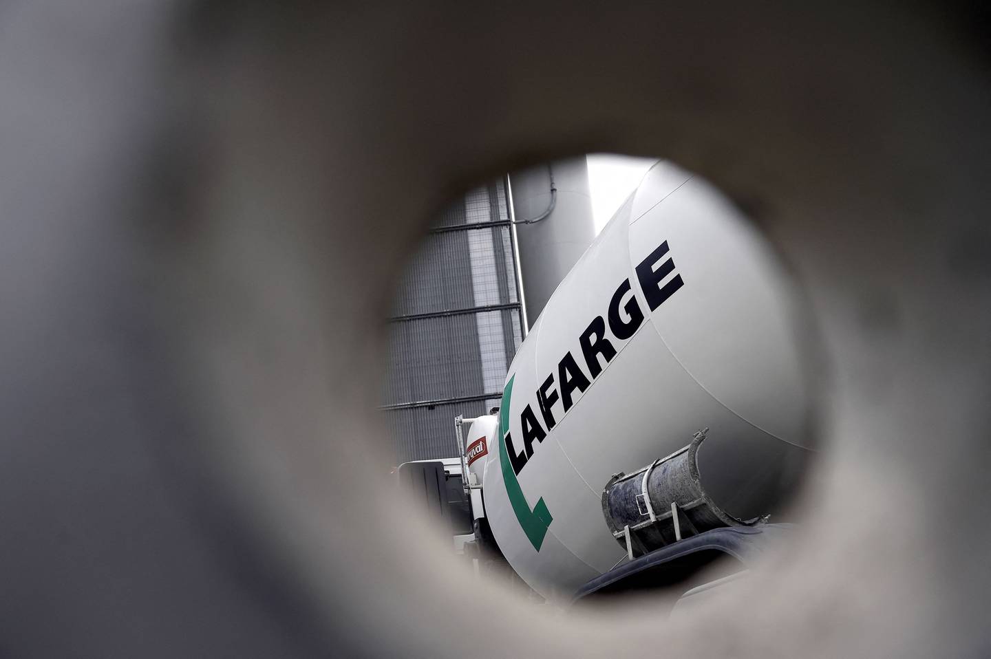 The ruling does not mean that Lafarge will automatically face a trial. AFP