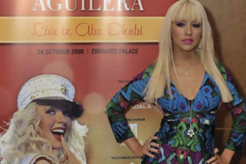 Christina Aguilera, seen, during a press conference at the Emirates Palace Hotel, in Abu Dhabi, United Arab Emirates, Thursday, Oct. 23, 2008. (AP Photo/Carl Abrams) *** Local Caption ***  ABU102_Emirates_Christina_Aguilera.jpg